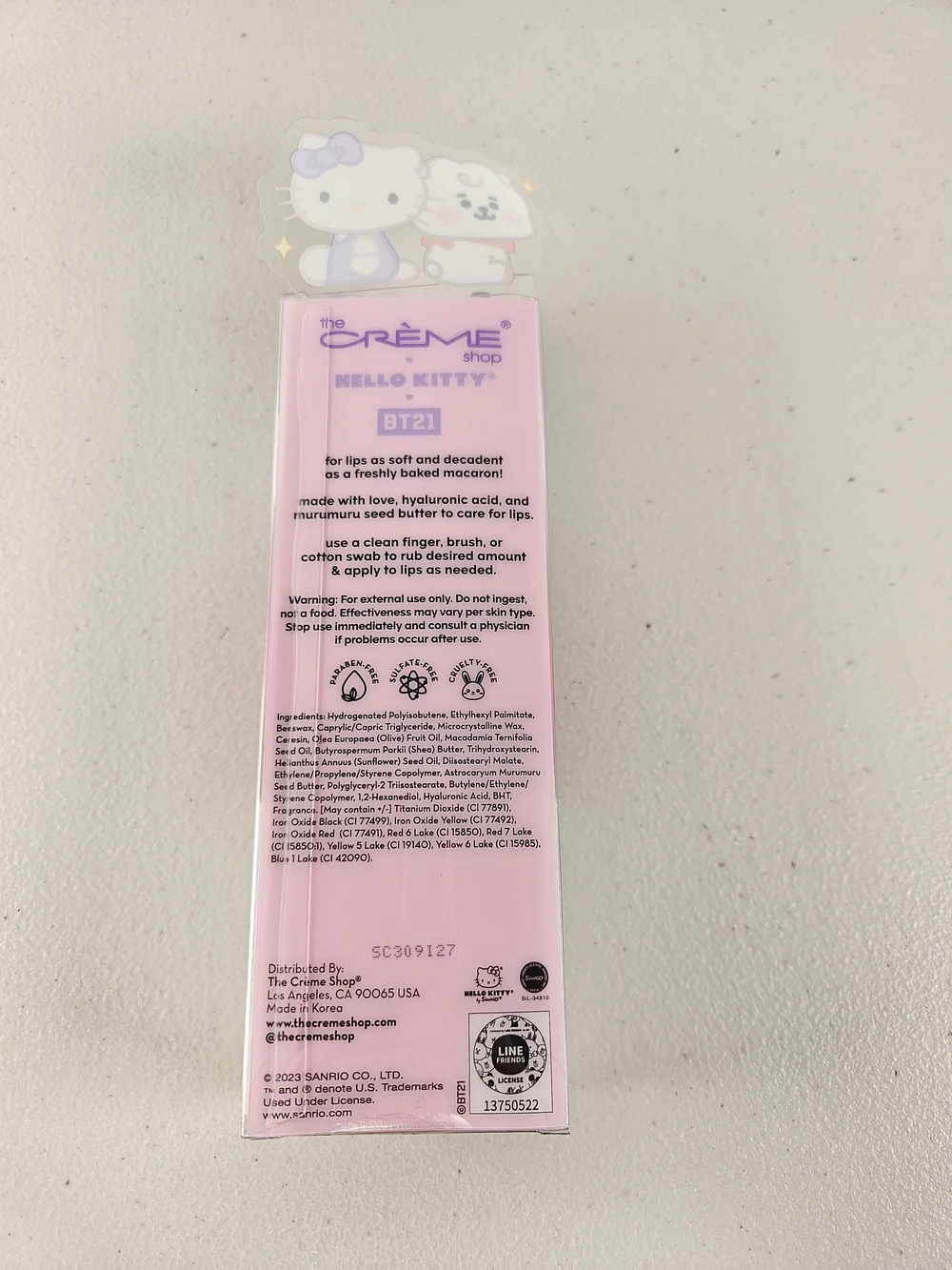 Hello Kitty Macaroon Lip balm Duo product mistaken for phone accessory